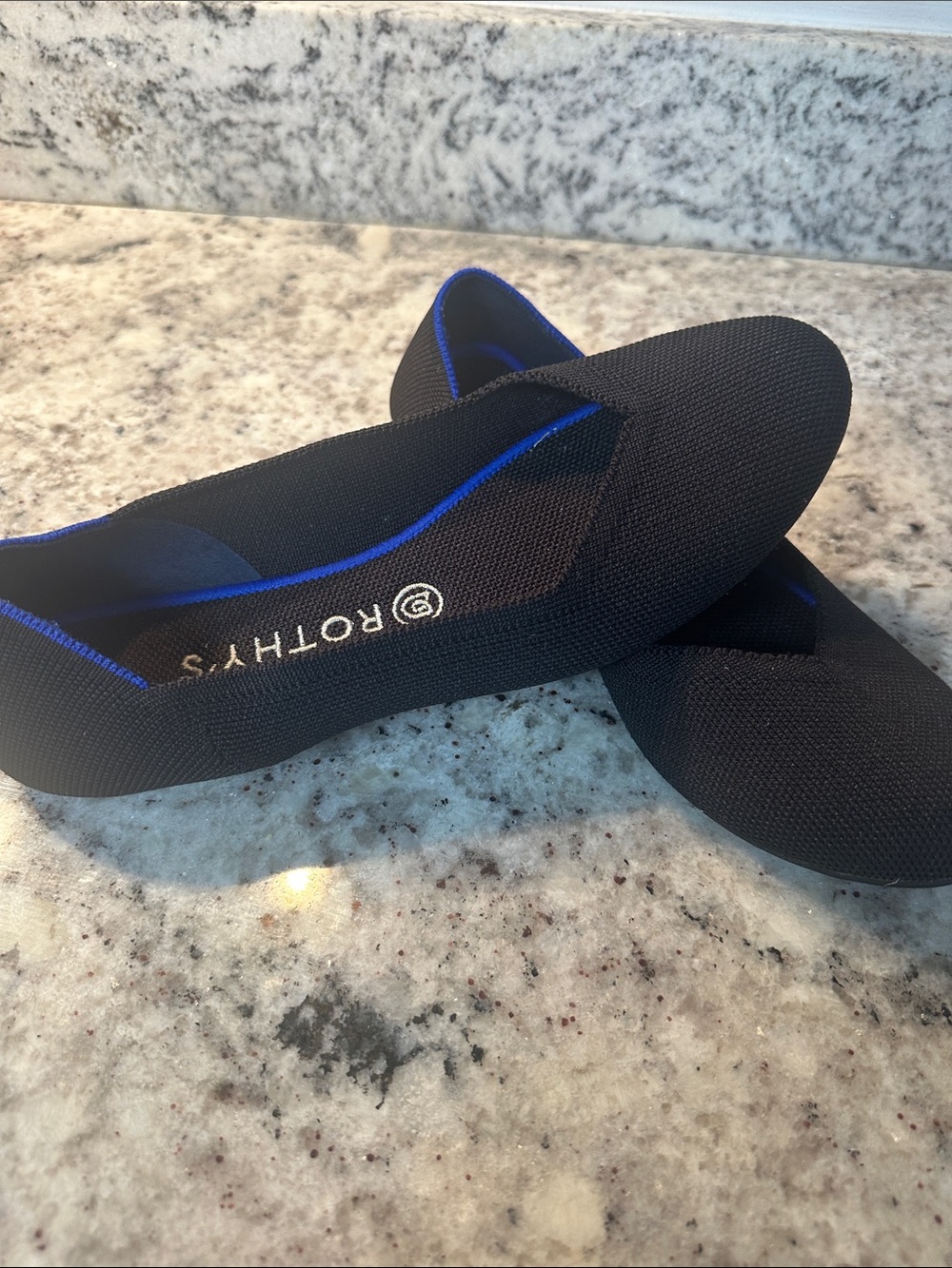 Rothy's Black Knit Slip-On Flats with Blue Trim